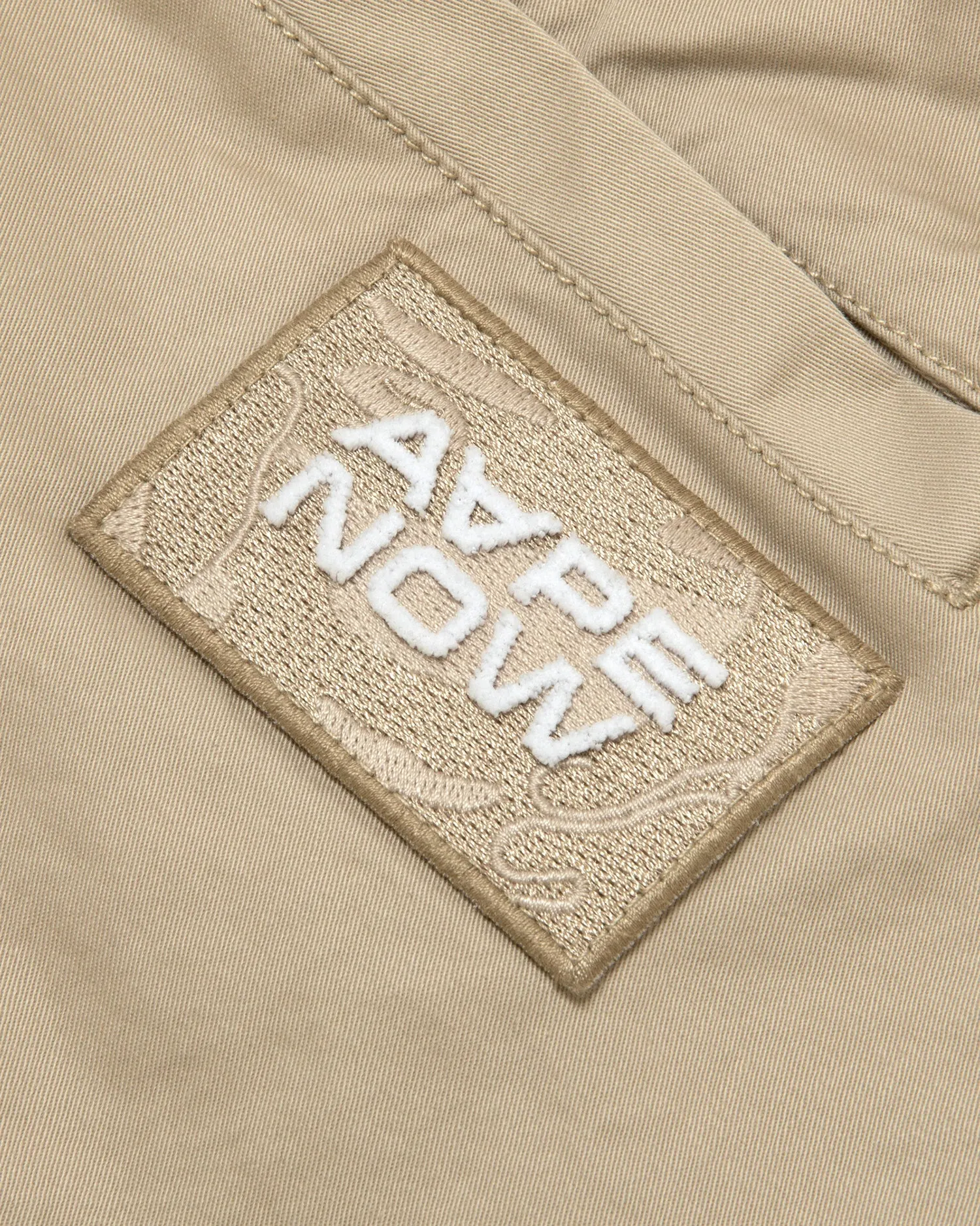 AAPENOW moonface logo tapered jogger pants