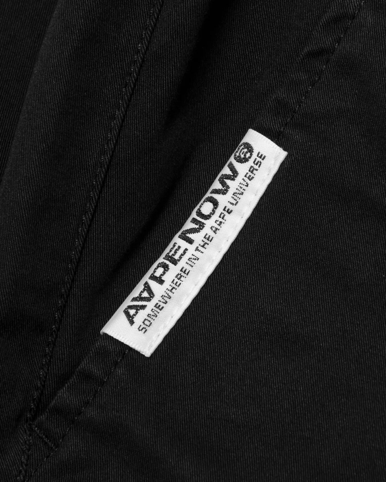 AAPENOW moonface logo tapered jogger pants