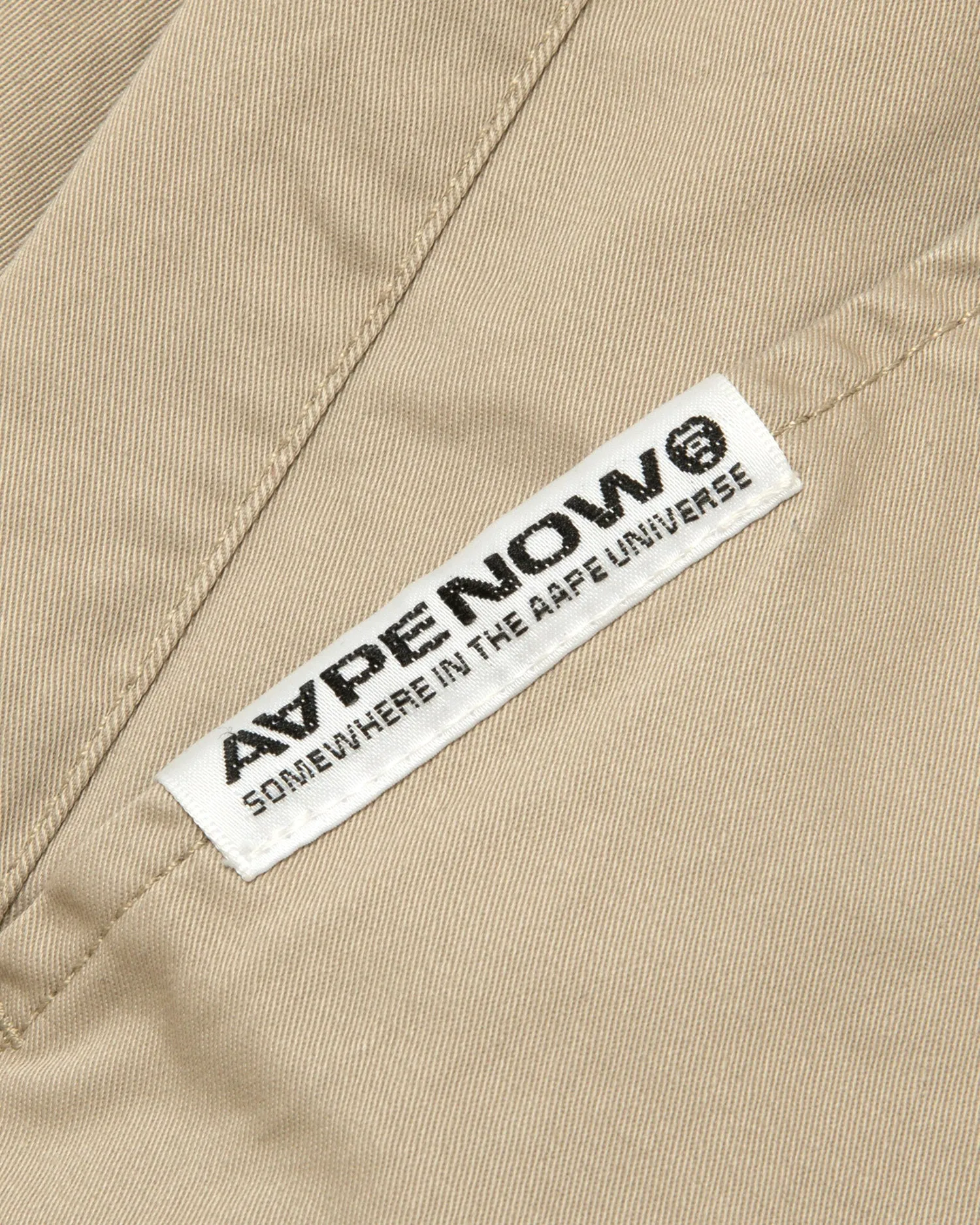 AAPENOW moonface logo tapered jogger pants