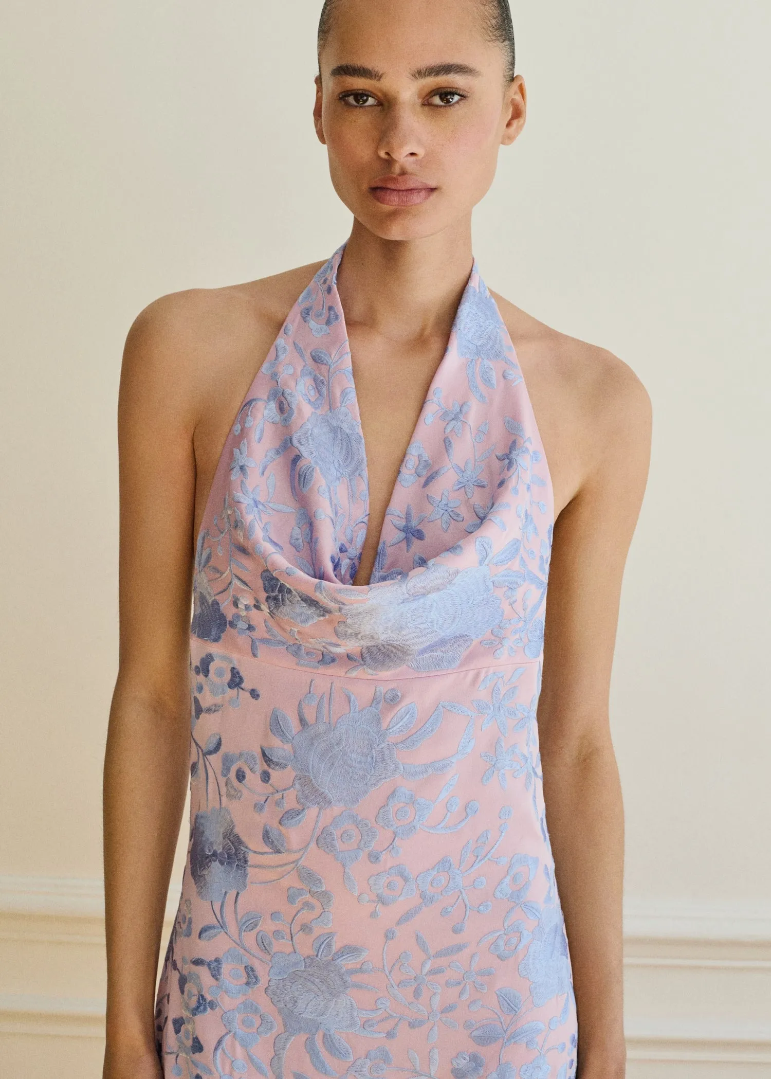 Asymmetrical dress with embroidered fringes