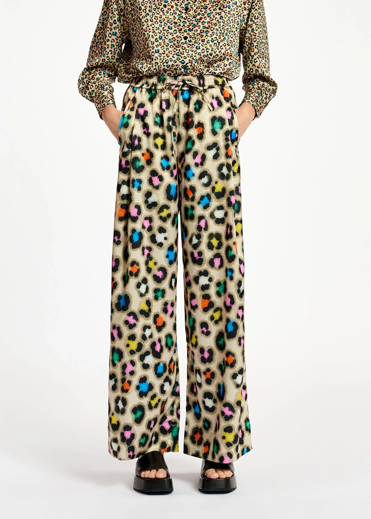 Beige wide-leg pants with multicolor leopard print