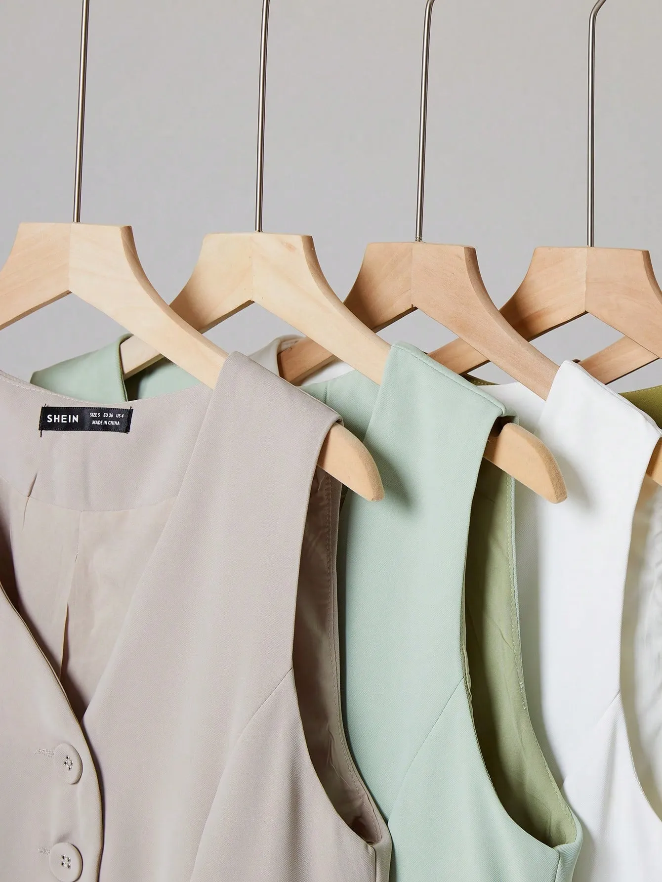 Chaleco unicolor BizChic para tu look de trabajo
